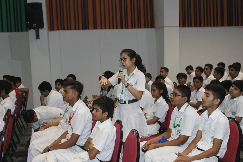 school students sitting together